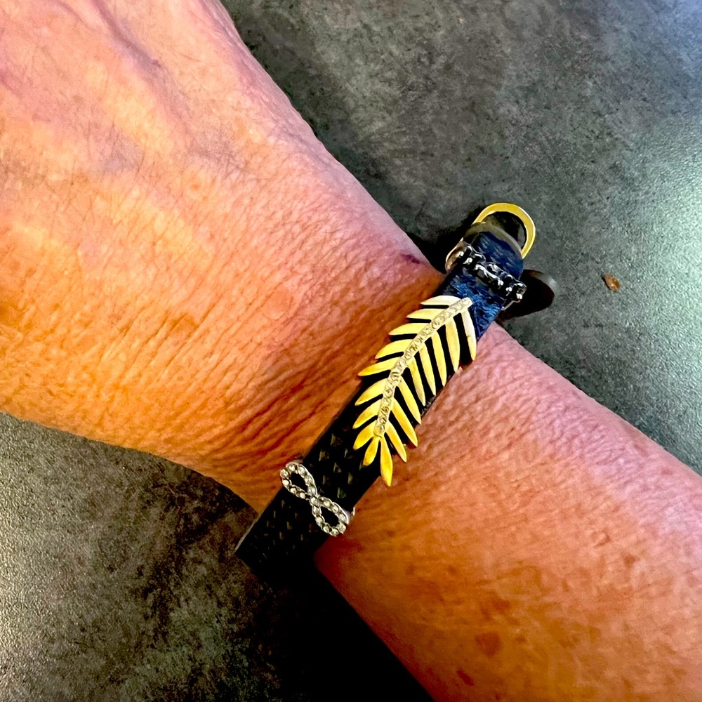 Keep collective bracelet with all the charms included.